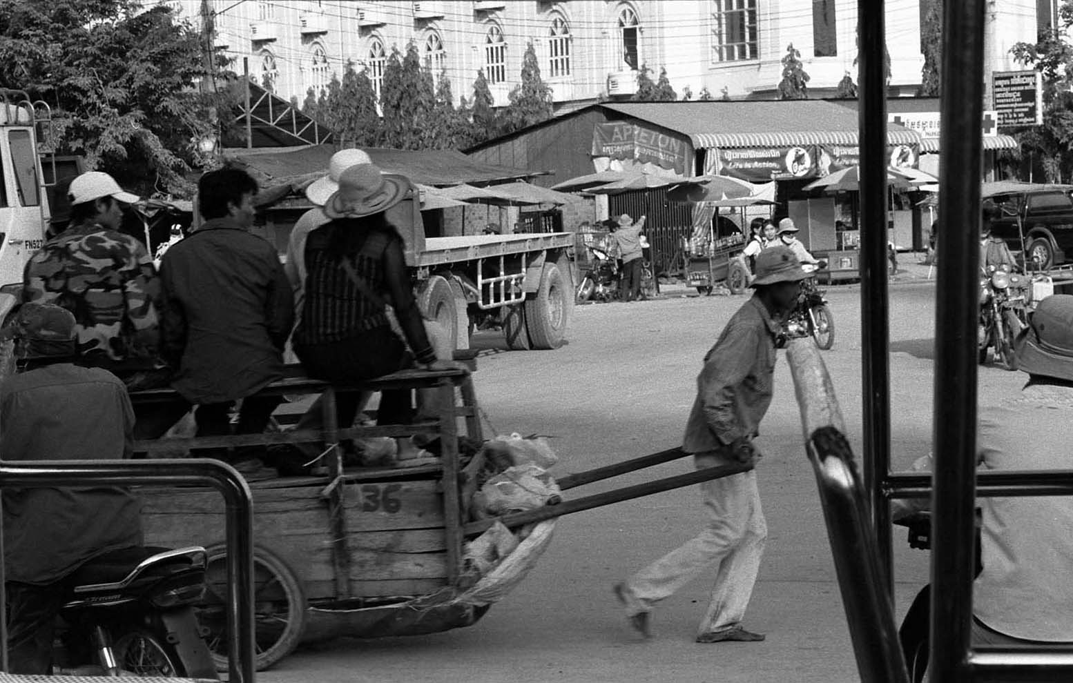 Cambodia, Poipet. Human coach
